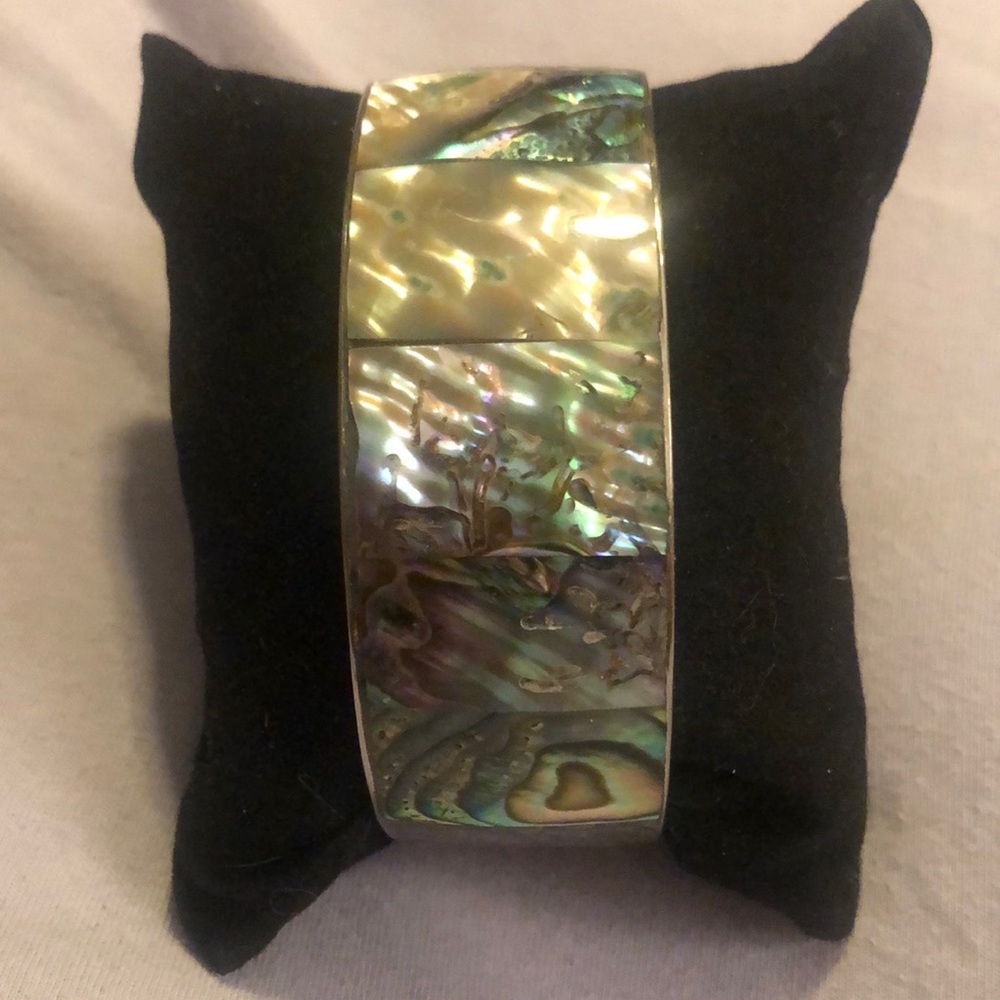 Abalone and silver toned bangle bracelet